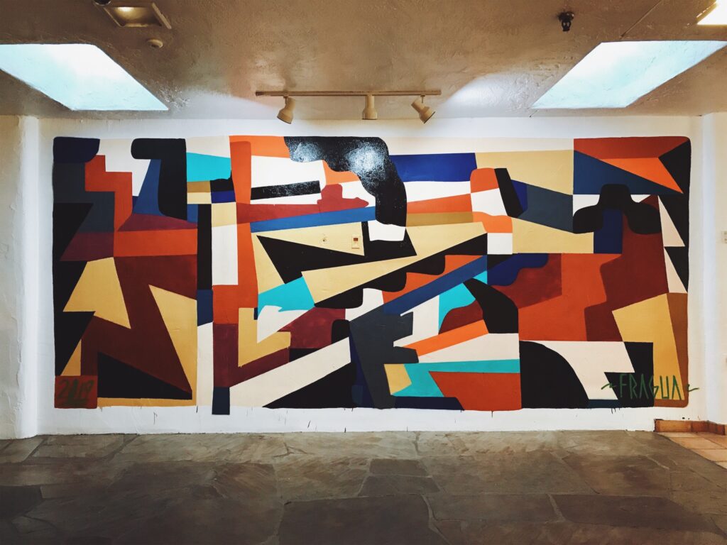 Jaque Fragua Sacred Walls art on wall.